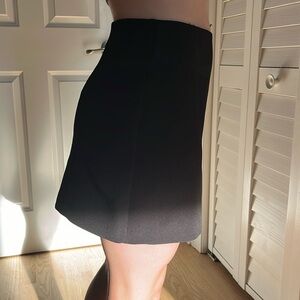 Very professional short skirt. Black with back side zipper.